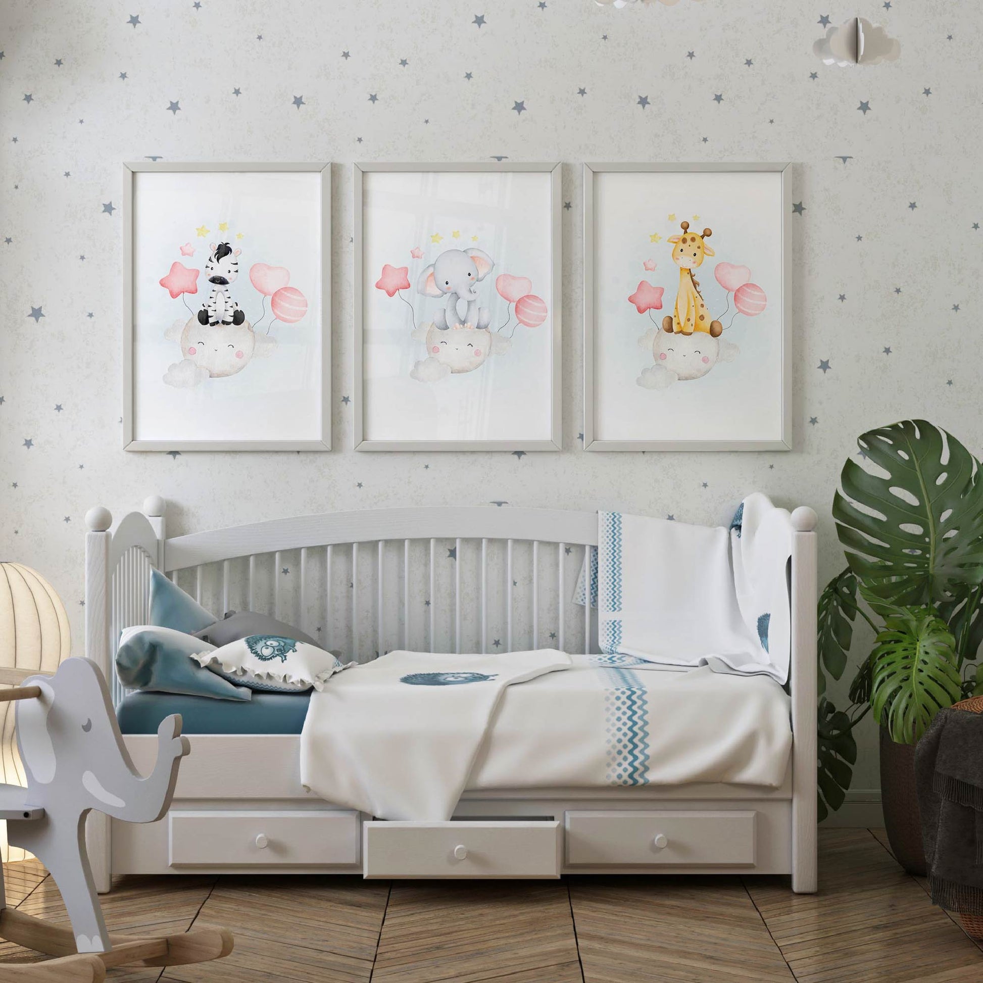 Three personalized animal-themed baby shower prints in framed canvas.
